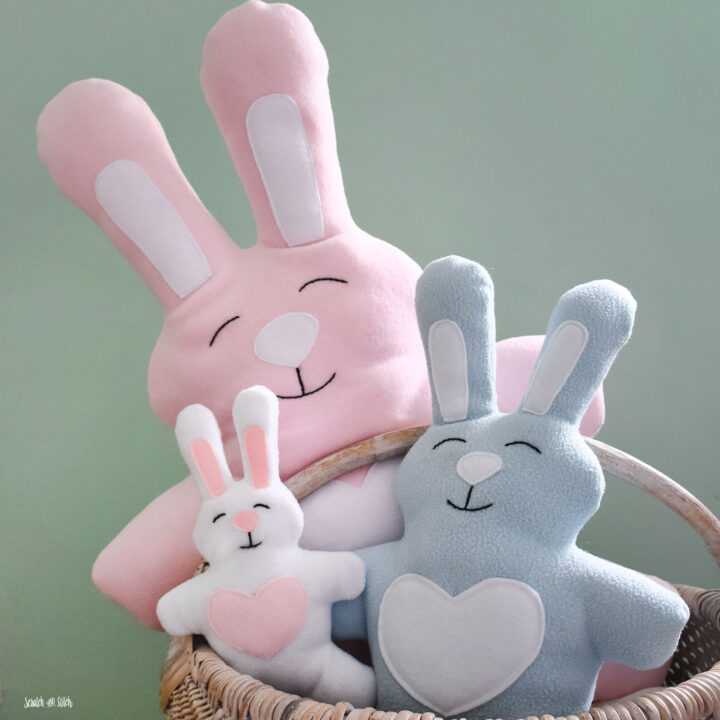 Love Bunny plush sewing pattern listing image with a finished bunny plush posed in a simple home setting. Cute handmade stuffed bunny from Scratch and Stitch with soft plush shape and friendly face details. Beginner-friendly plush sewing pattern for a sweet gift or seasonal plush project.