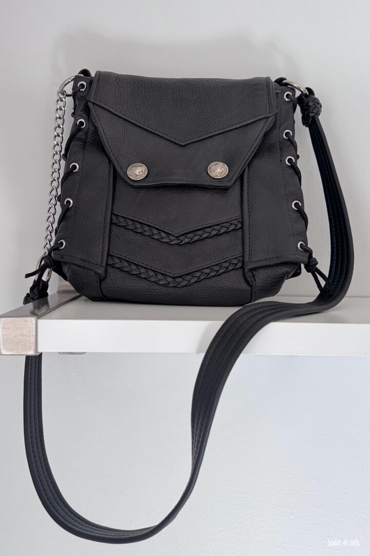 One-of-a-kind leather memory bag handmade from a father’s biker vest and turned into a crossbody purse