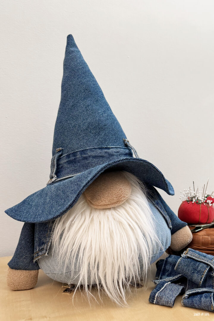 plush gnome sewing pattern made from old jeans with a wizard style hat and fuzzy white beard